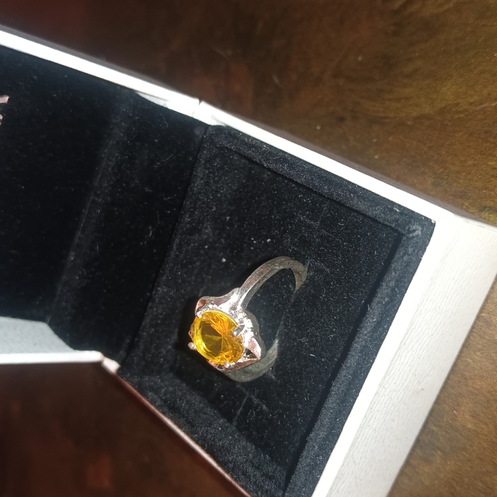 Elegant Silver Ring with Yellow Gemstone